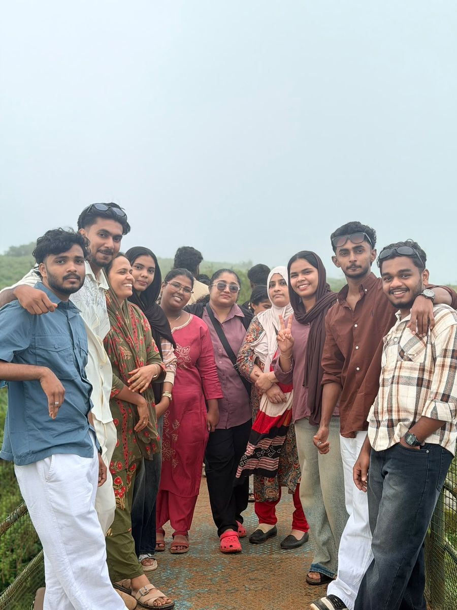 Our group at a misty Chikmagalur viewpoint